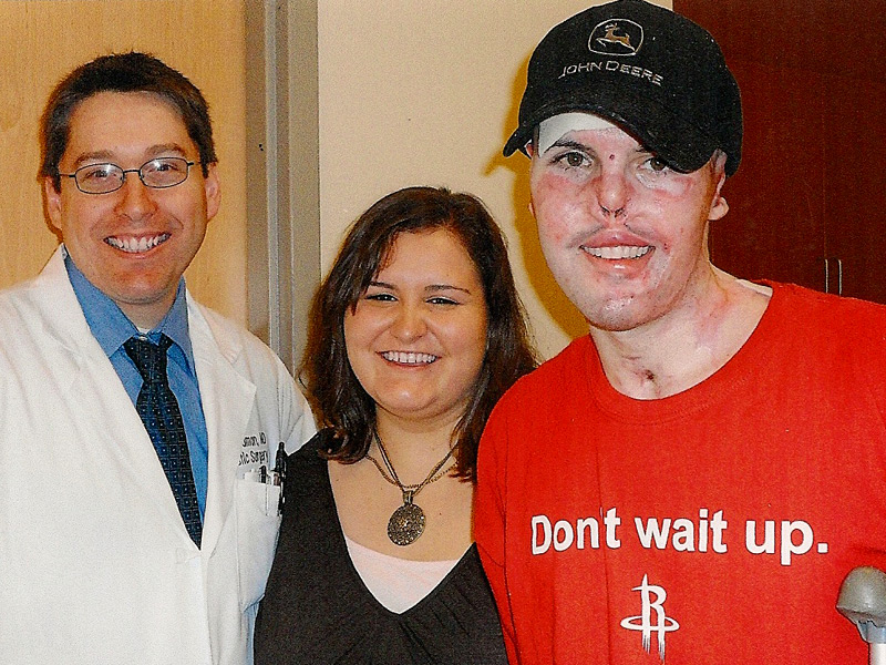 Michael Feldman, M.D.; Tony's wife, Sharon; and Tony shortly after he was released from his inpatient stay