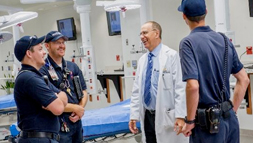 Joseph Ornato, M.D., with local first responders