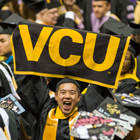 Student celebrating at Commencement