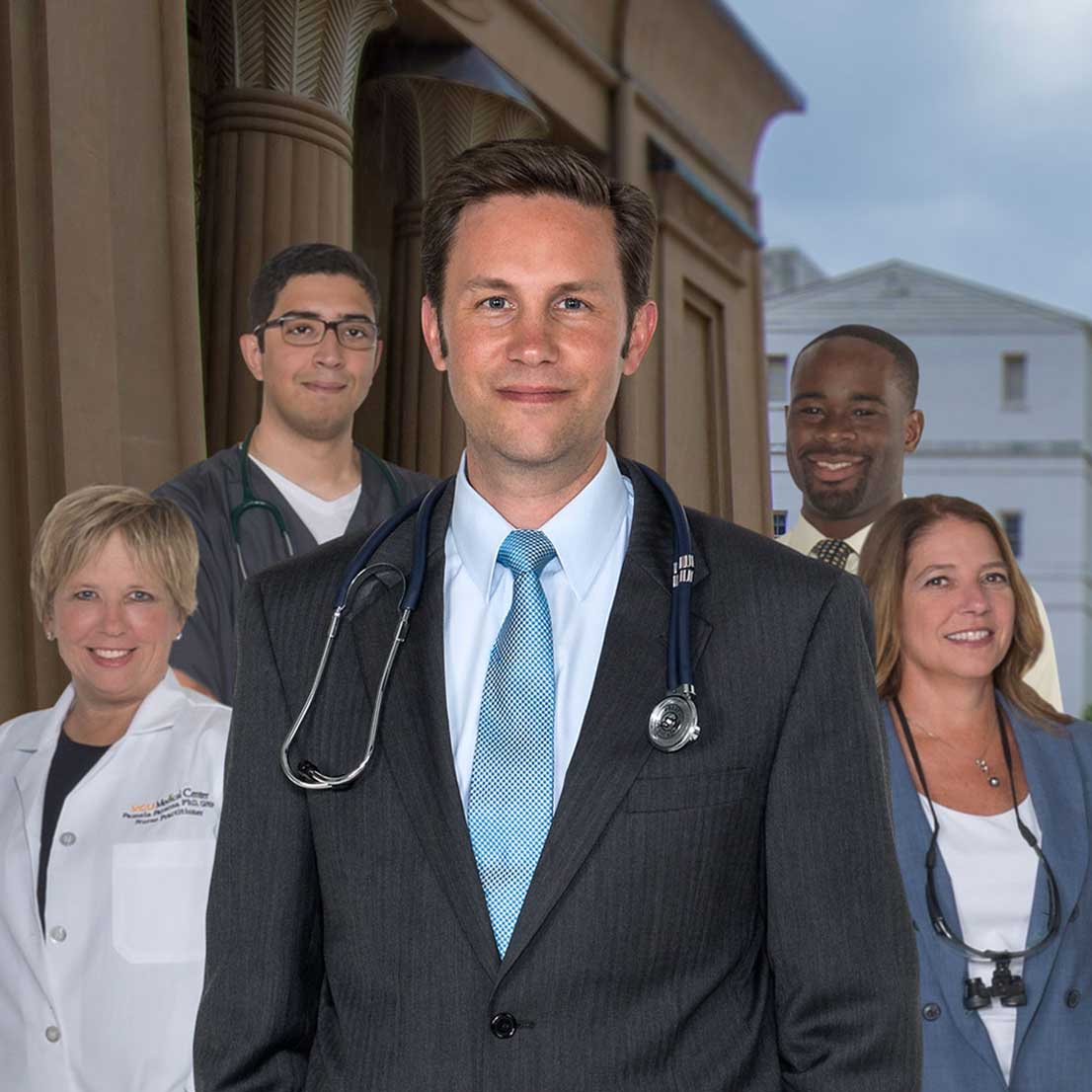 Alan Dow with four other individuals from different health professions posing in front of the Egyptian Building at VCU Medical Center
