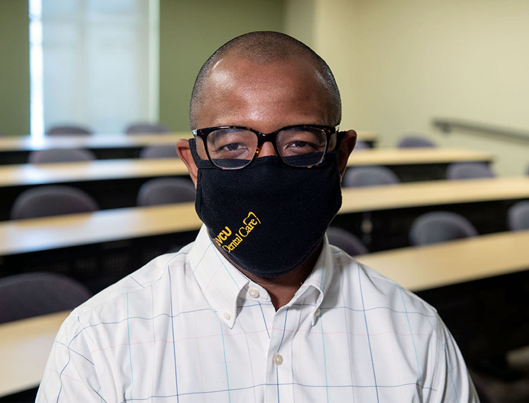 Portrait of Carlos Smith in his classroom.